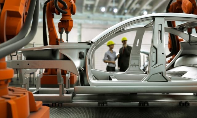 Bot working on automotive production line